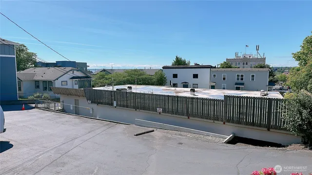 a view of a bench in backyard of the house