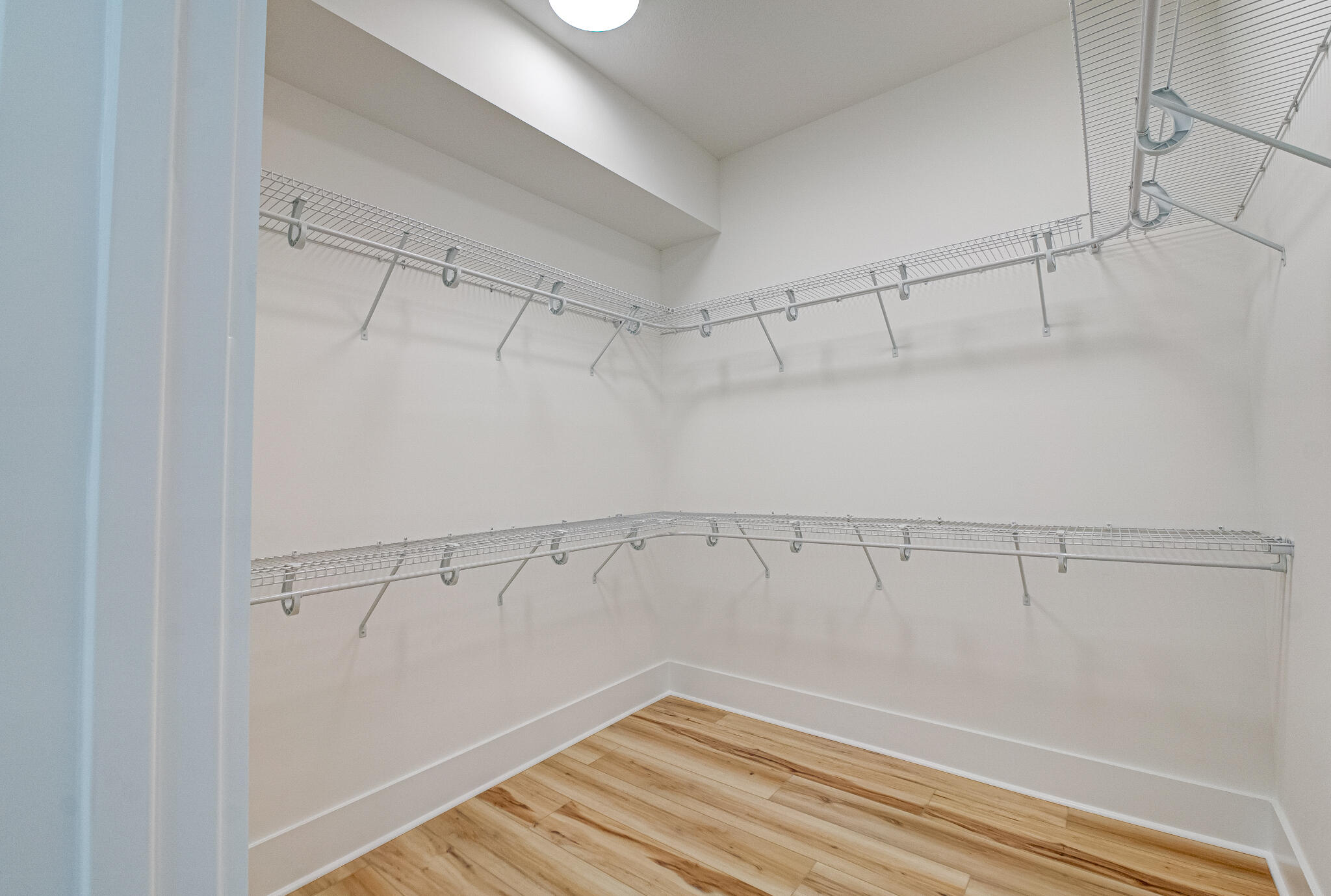 174 Grande Pointe Cir Inlet Beach Inlet Beach, FL 32461 - Photo 17 of 55 a view of a room with racks on the wall