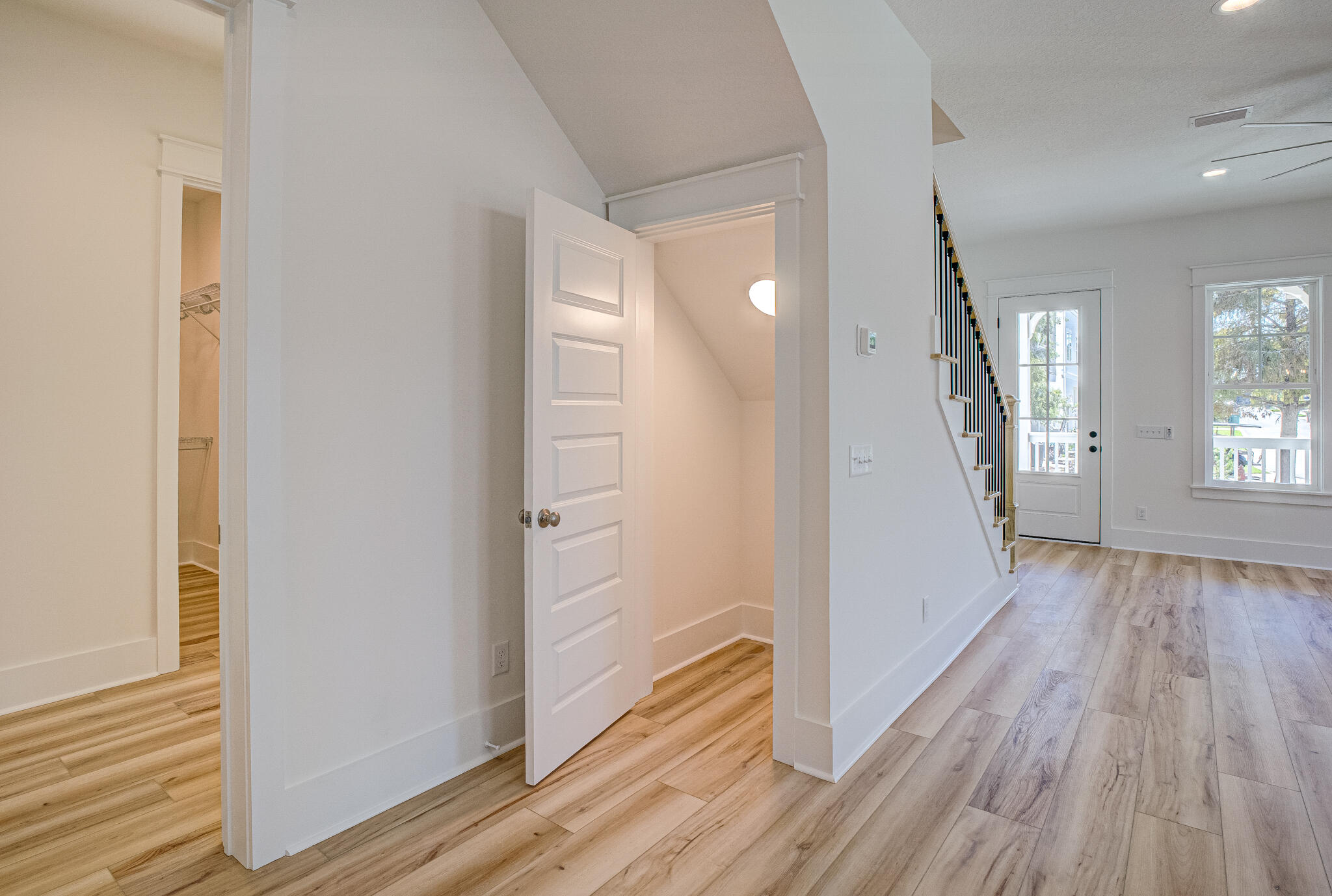 174 Grande Pointe Cir Inlet Beach Inlet Beach, FL 32461 - Photo 23 of 55 wooden floor in an empty room with a window