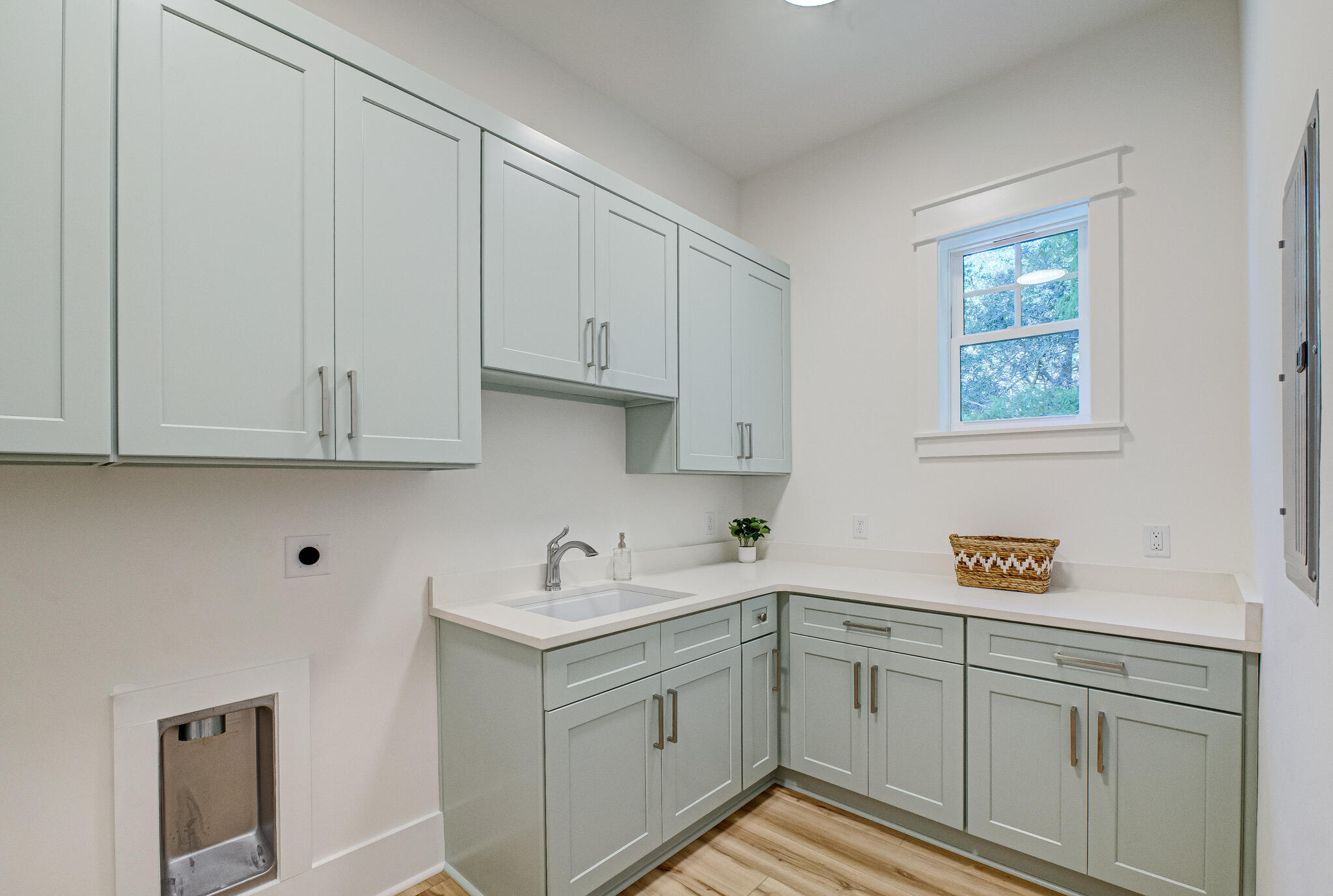 174 Grande Pointe Cir Inlet Beach Inlet Beach, FL 32461 - Photo 24 of 55 a kitchen with white cabinets and white appliances
