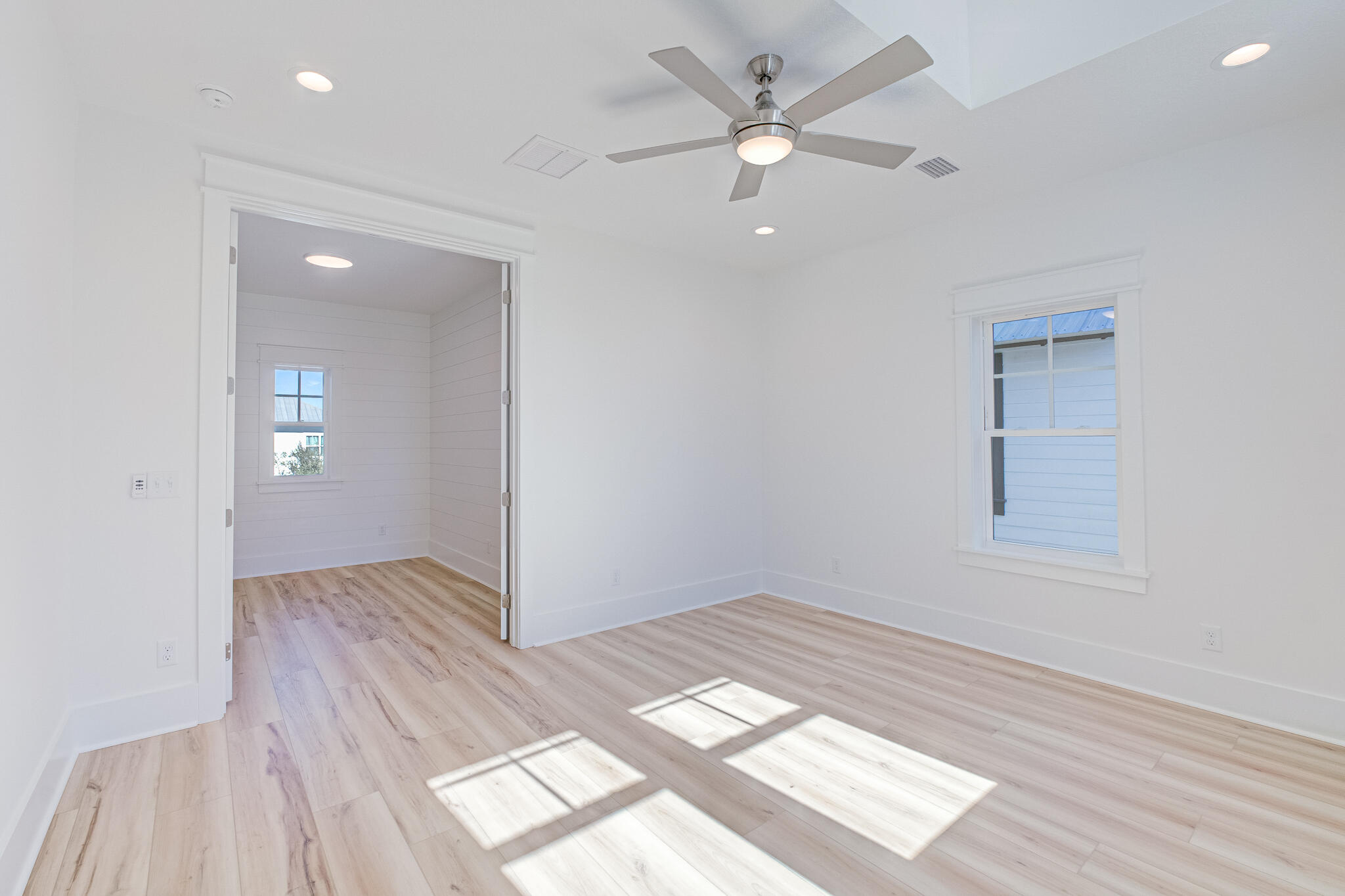 174 Grande Pointe Cir Inlet Beach Inlet Beach, FL 32461 - Photo 31 of 55 wooden floor in an empty room with a window