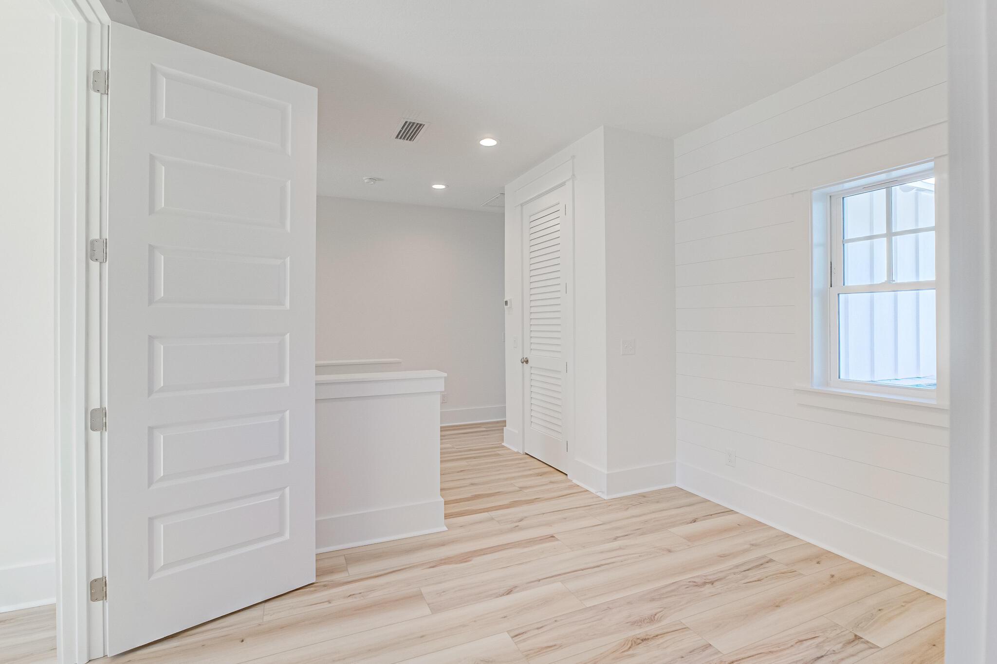 174 Grande Pointe Cir Inlet Beach Inlet Beach, FL 32461 - Photo 33 of 55 wooden floor in an empty room with a window
