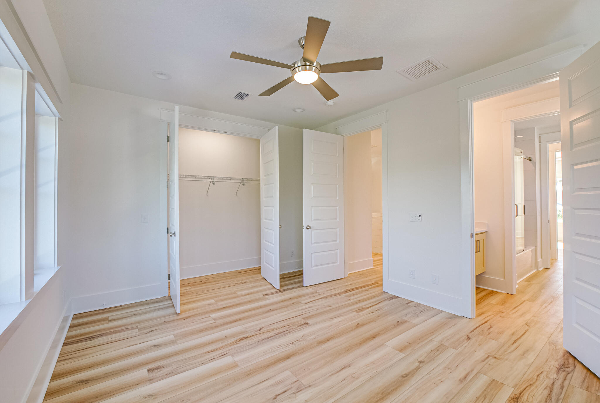 174 Grande Pointe Cir Inlet Beach Inlet Beach, FL 32461 - Photo 36 of 55 a view of empty room with wooden floor