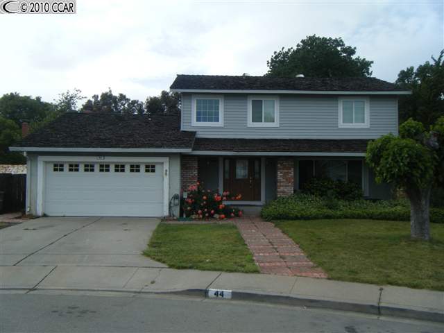 44 Tareyton Court San Ramon, CA 94583 - Photo 1 of 1 a front view of a house with a yard and garage