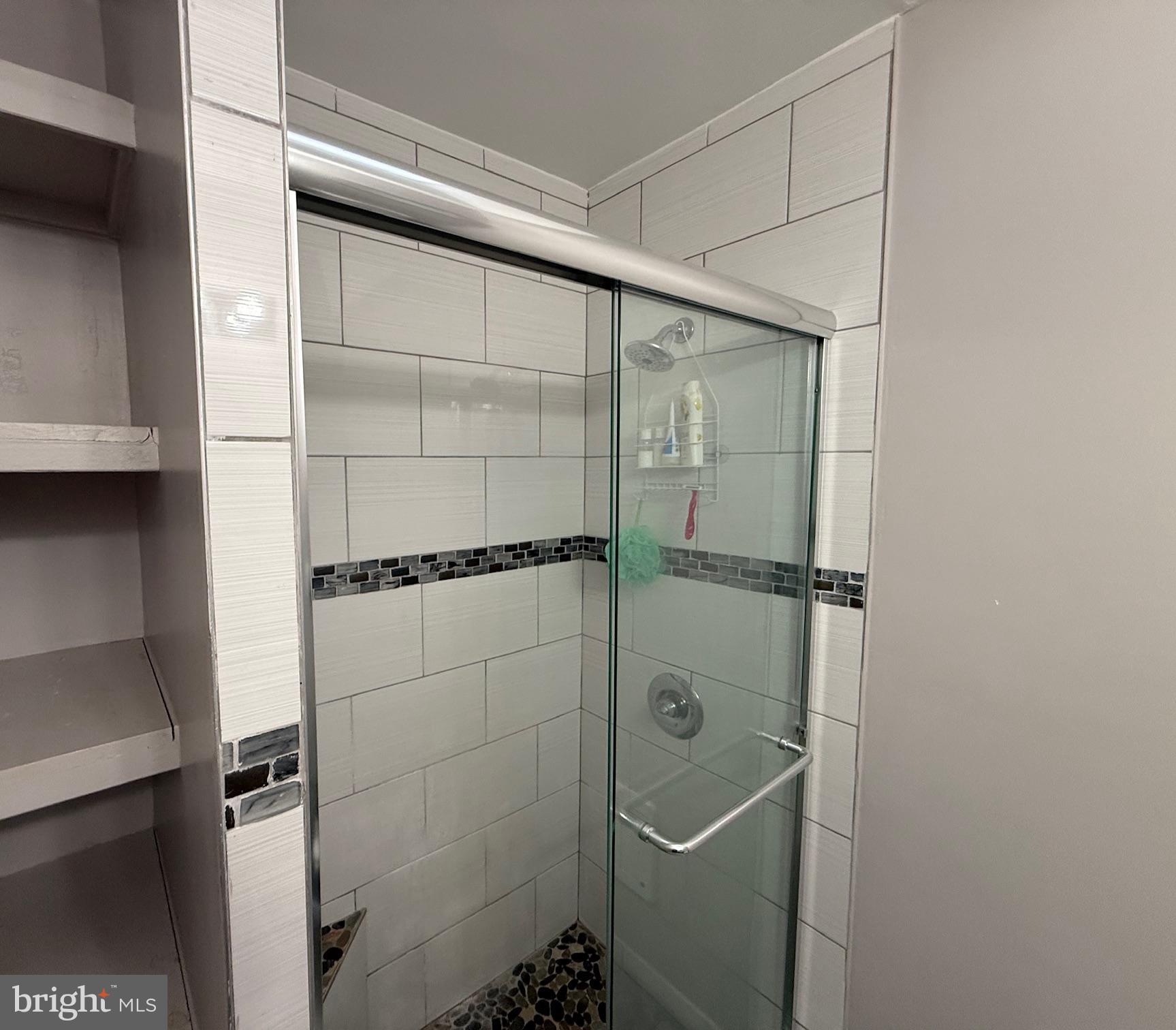 6234 Cottage Street Philadelphia, PA 19135 - Photo 11 of 16 a bathroom with a shower