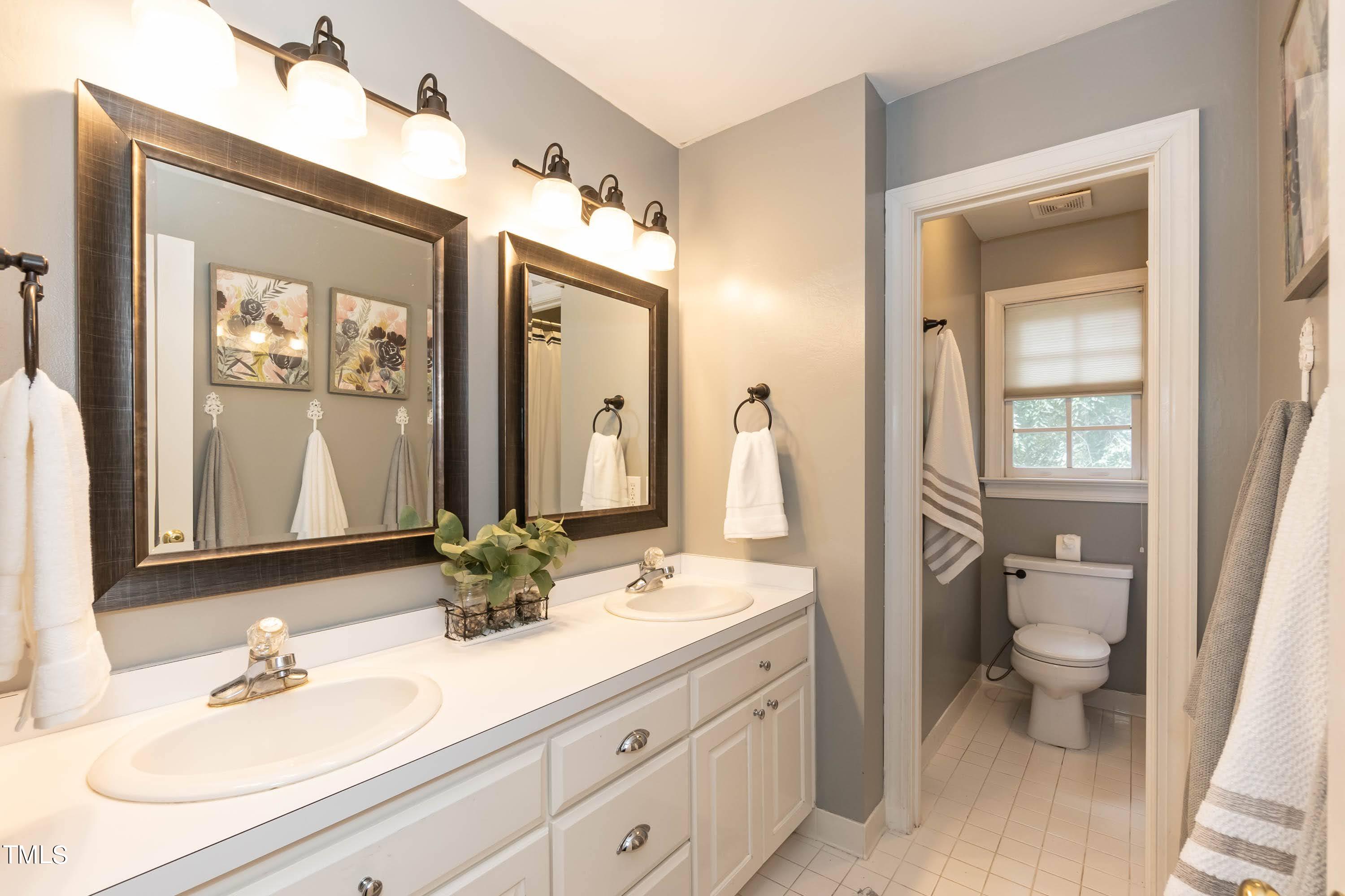4112 Ridgebrook Bluffs Drive Raleigh, NC 27603 - Photo 36 of 40 Dual Vanity with Tub/Shower combo.
