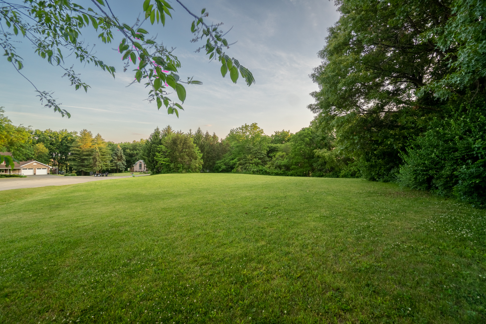 0 Lemke Drive Byron, IL 61010 - Photo 15 of 16 a view of outdoor space with deck and trees