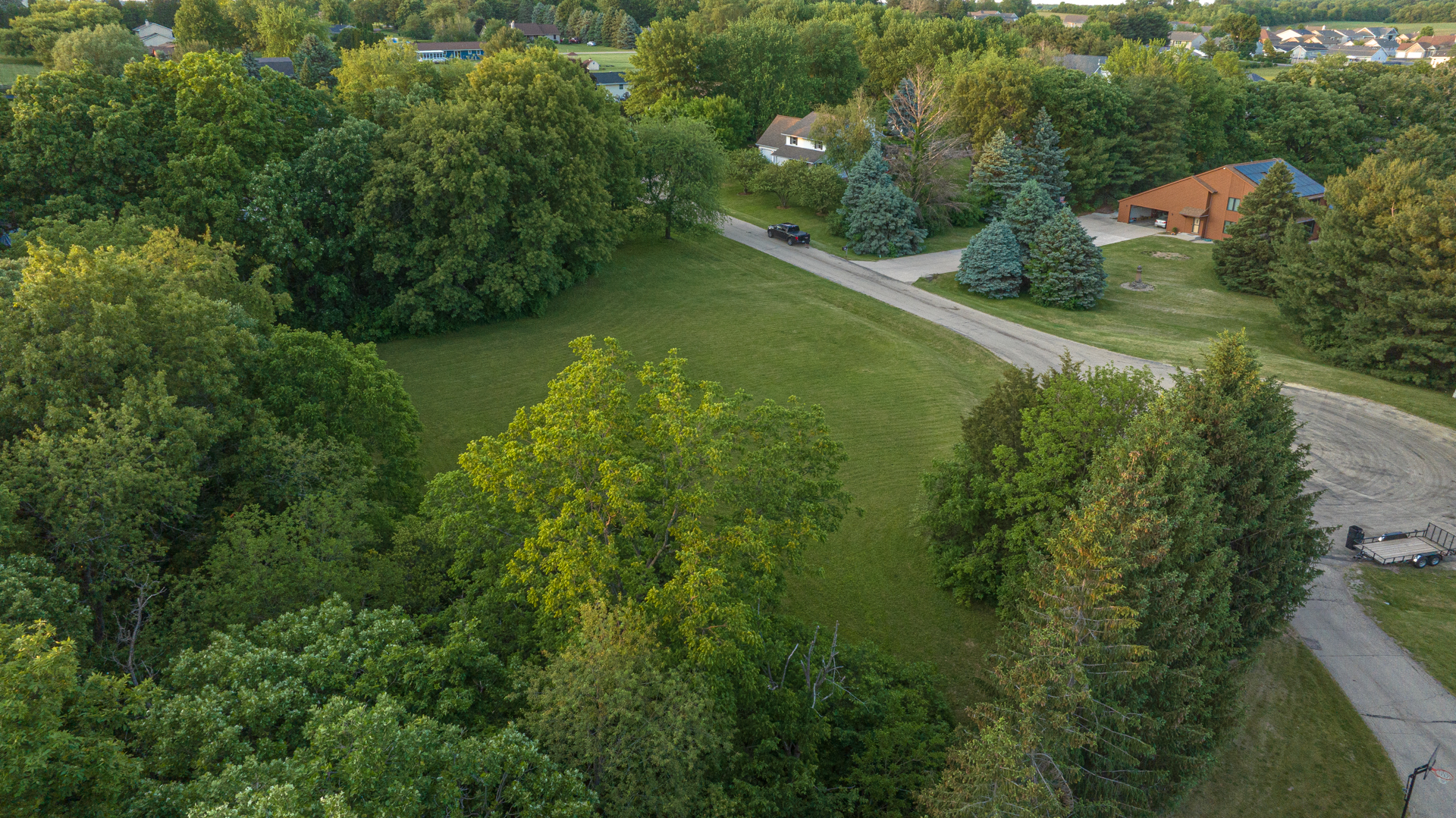 0 Lemke Drive Byron, IL 61010 - Photo 4 of 16 an aerial view of residential houses with outdoor space and trees