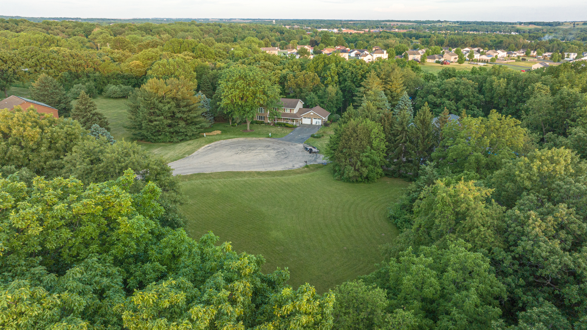 0 Lemke Drive Byron, IL 61010 - Photo 6 of 16 an aerial view of residential houses with outdoor space and trees