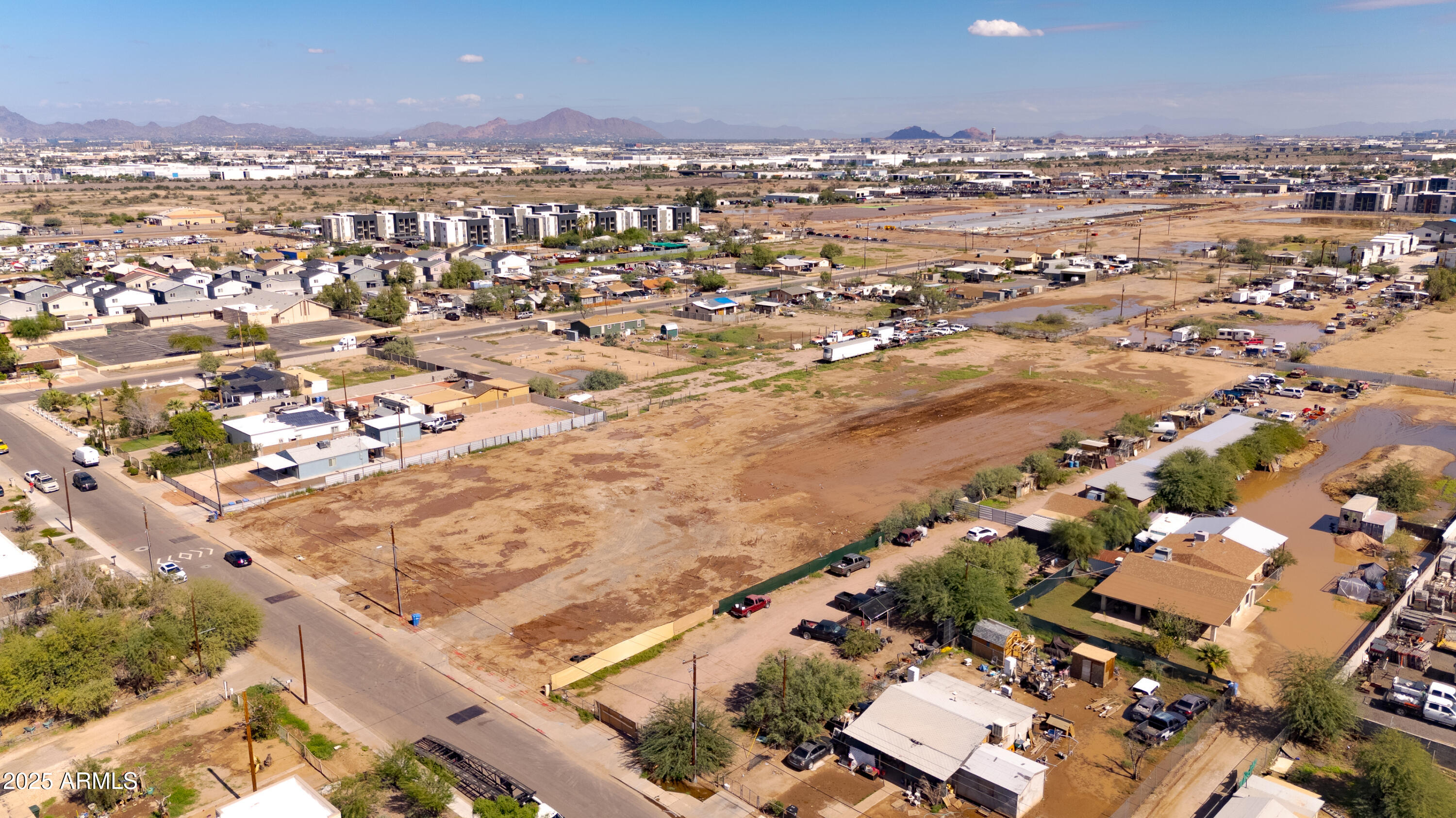 4035 South 9th Street, Unit 20/22 Phoenix, AZ 85040 - Photo 14 of 45 an aerial view of residential building with parking space