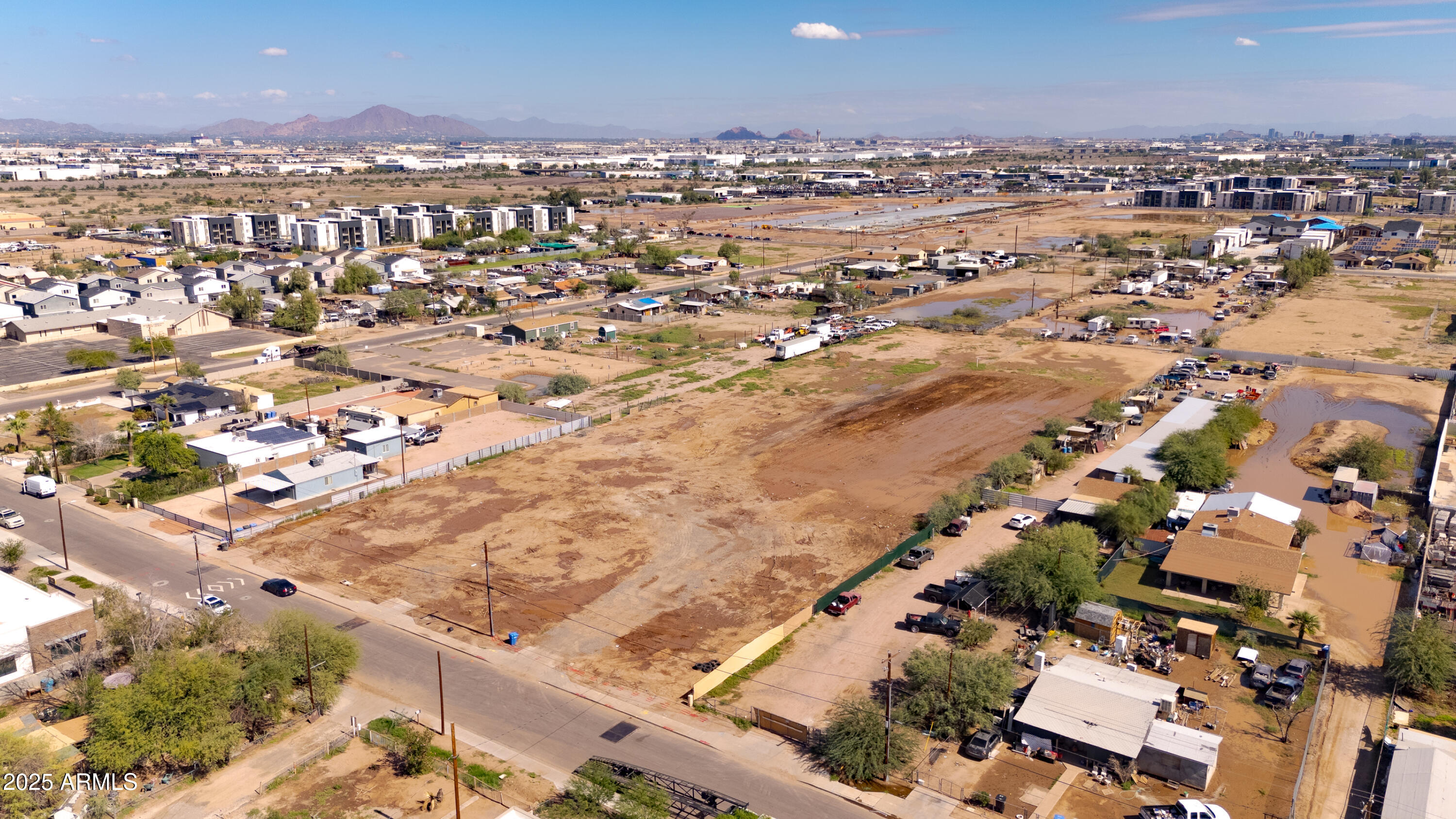 4035 South 9th Street, Unit 20/22 Phoenix, AZ 85040 - Photo 15 of 45 an aerial view of residential houses with outdoor space