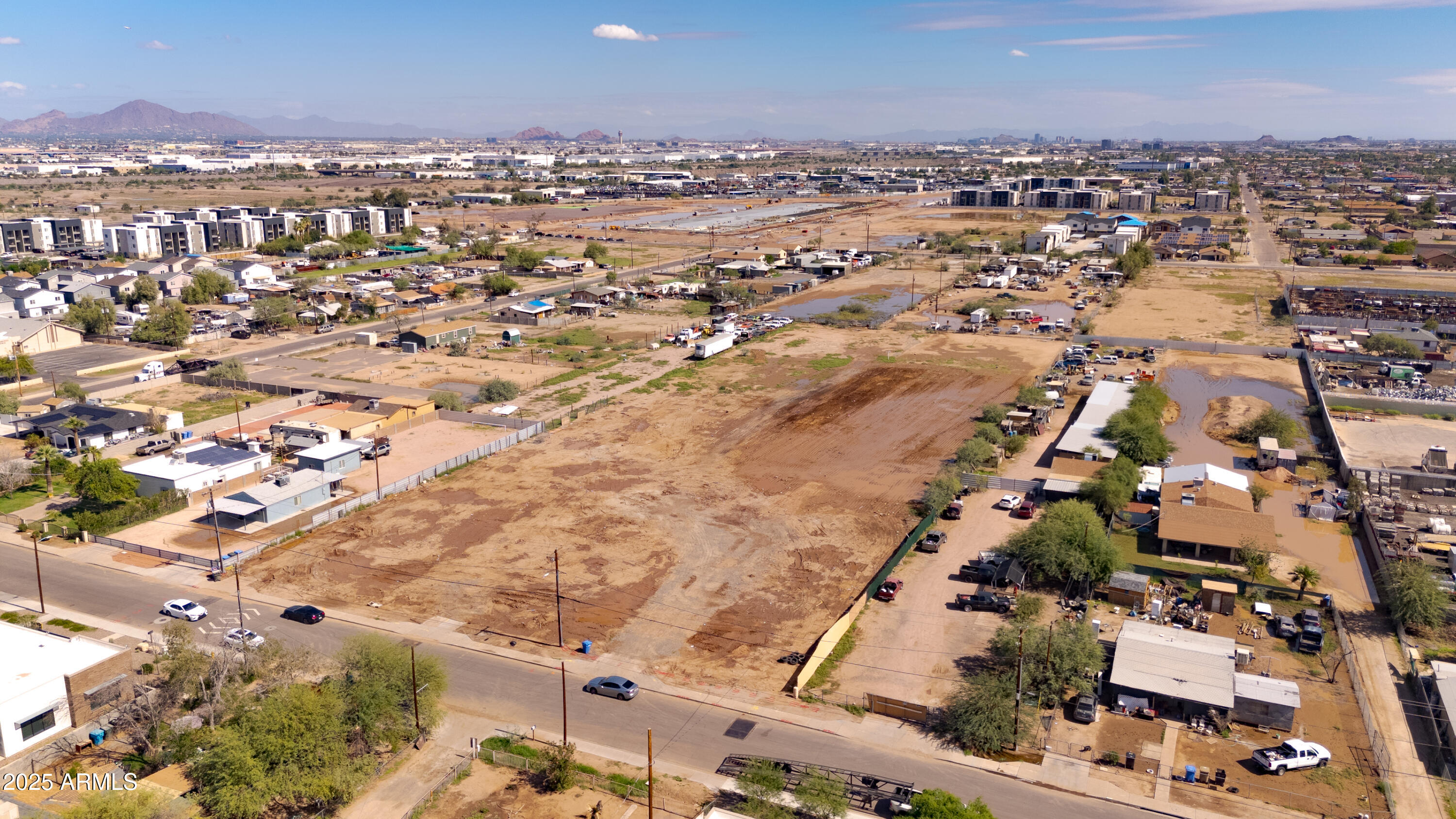 4035 South 9th Street, Unit 20/22 Phoenix, AZ 85040 - Photo 17 of 45 an aerial view of residential building with parking space