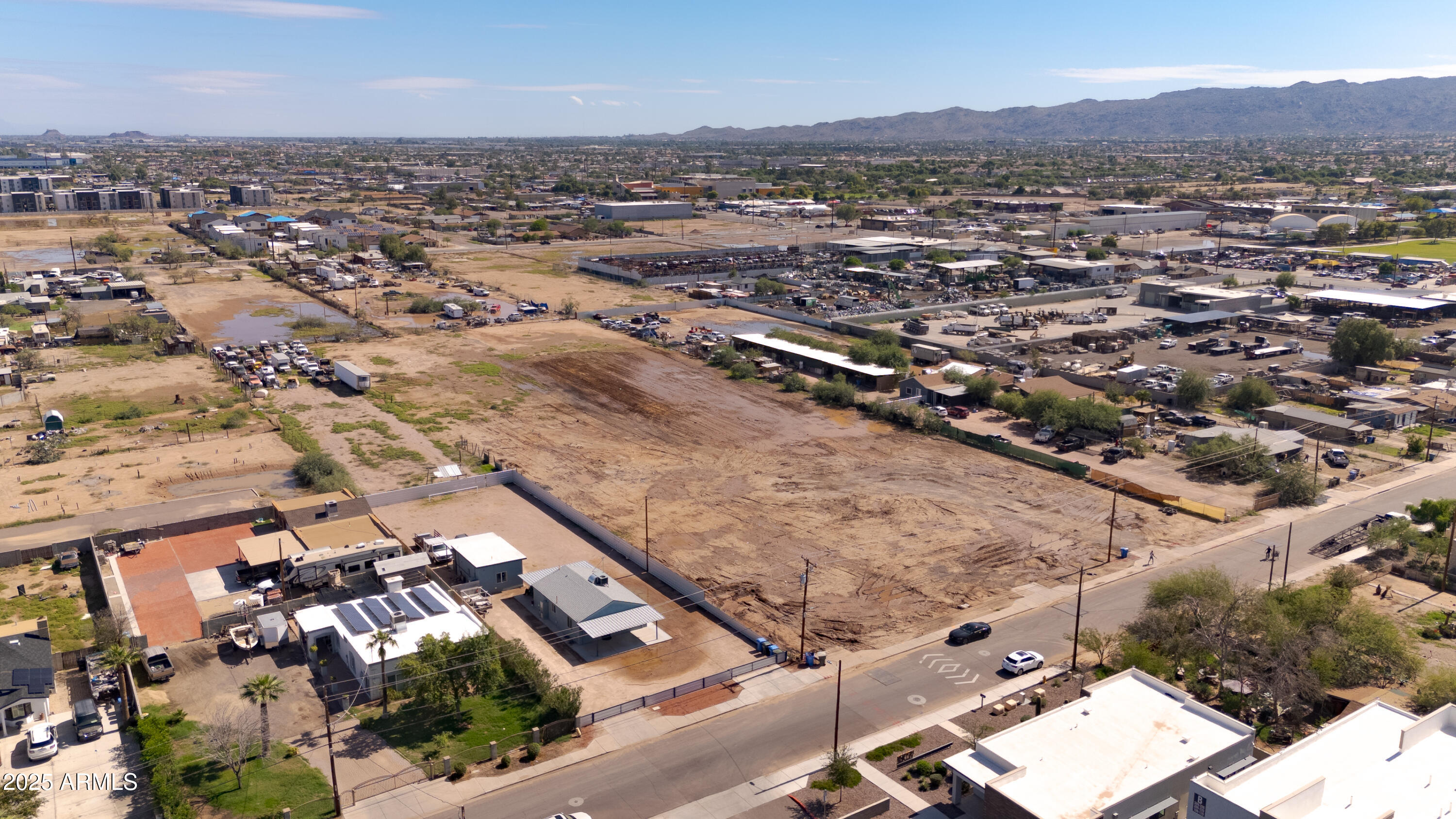 4035 South 9th Street, Unit 20/22 Phoenix, AZ 85040 - Photo 20 of 45 an aerial view of residential houses with outdoor space