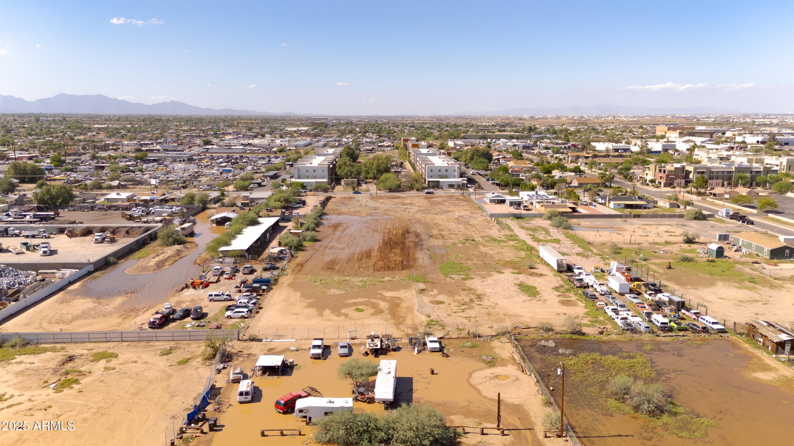 4035 South 9th Street, Unit 20/22 Phoenix, AZ 85040 - Photo 29 of 45 an aerial view of residential building and parking space