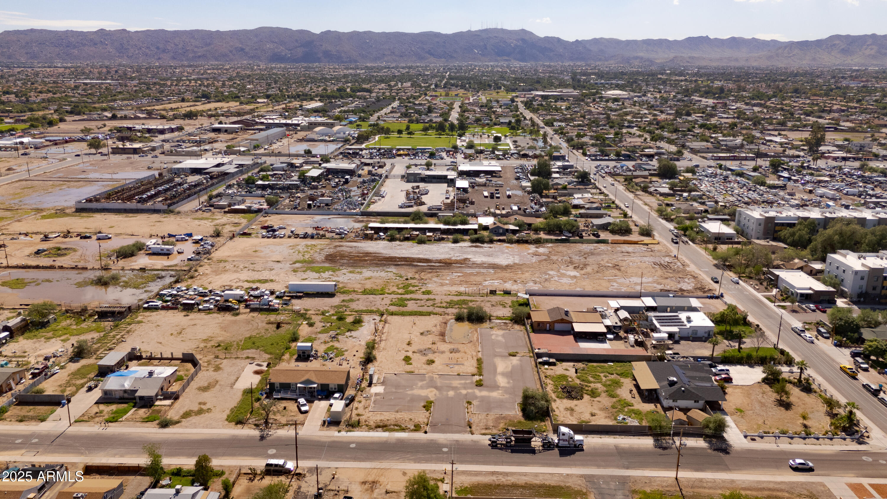 4035 South 9th Street, Unit 20/22 Phoenix, AZ 85040 - Photo 3 of 45 an aerial view of residential houses and outdoor space