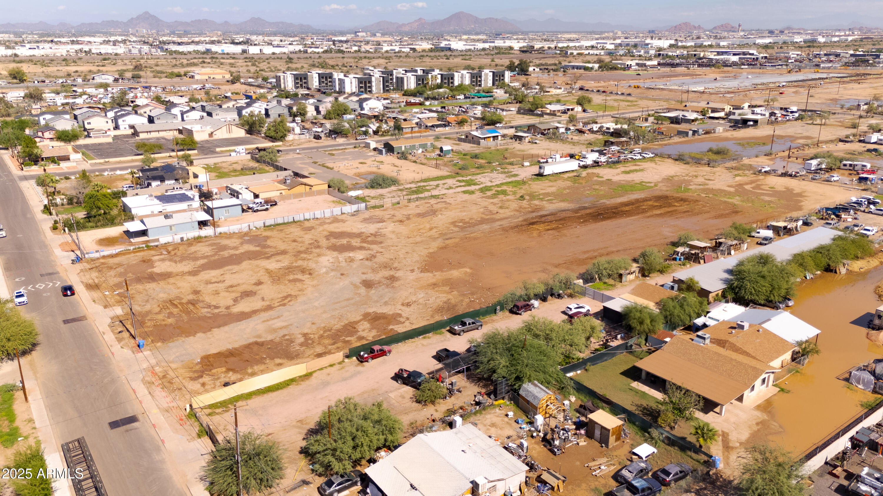 4035 South 9th Street, Unit 20/22 Phoenix, AZ 85040 - Photo 36 of 45 an aerial view of residential houses with outdoor space