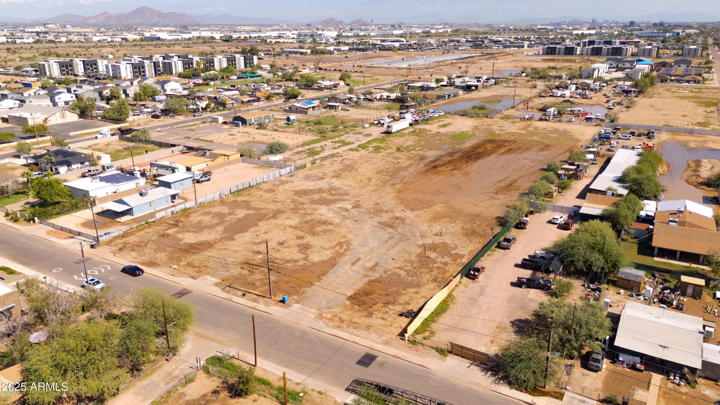 4035 South 9th Street, Unit 20/22 Phoenix, AZ 85040 - Photo 38 of 45 an aerial view of residential houses with outdoor space