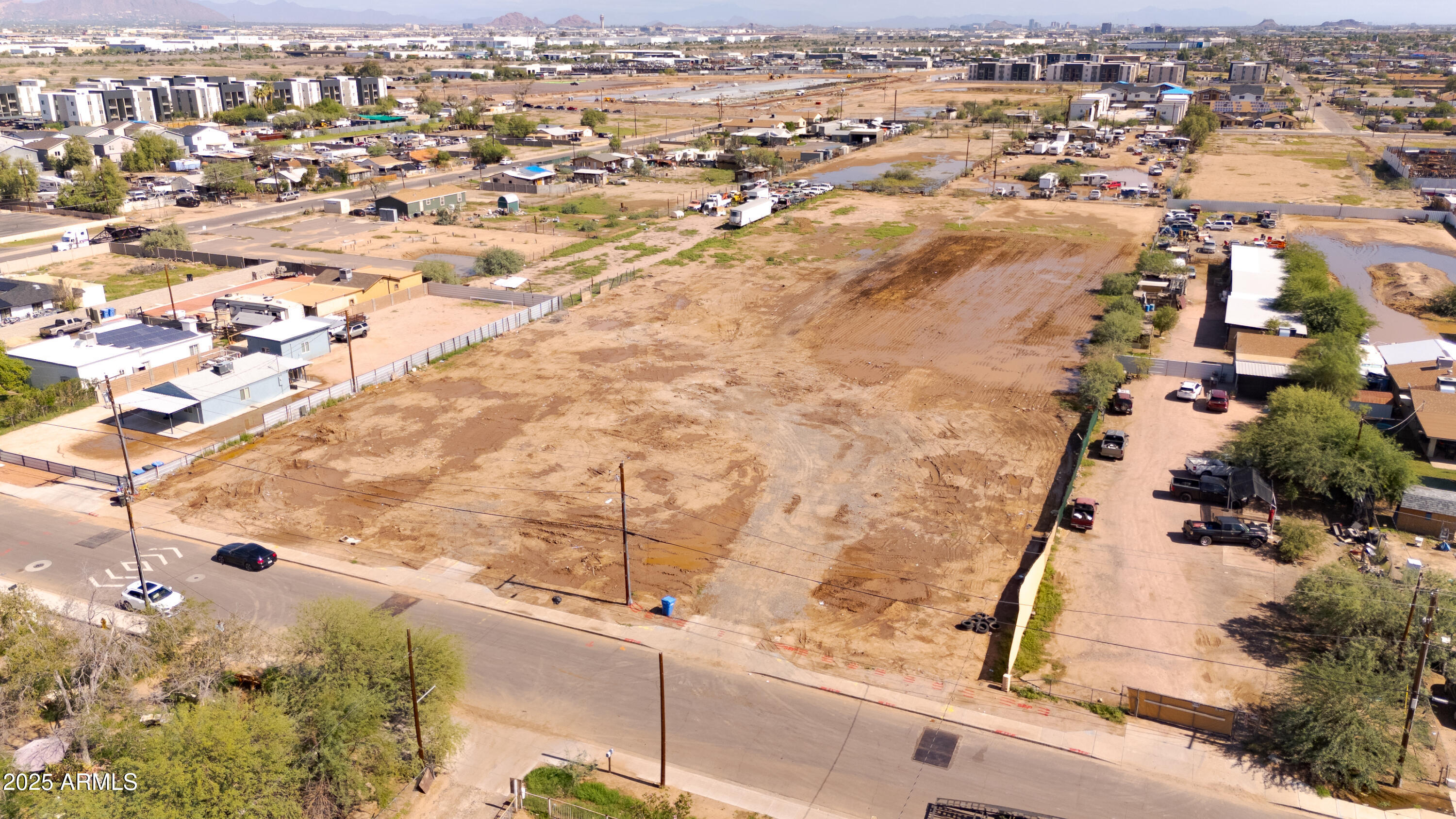 4035 South 9th Street, Unit 20/22 Phoenix, AZ 85040 - Photo 39 of 45 an aerial view of residential houses with outdoor space