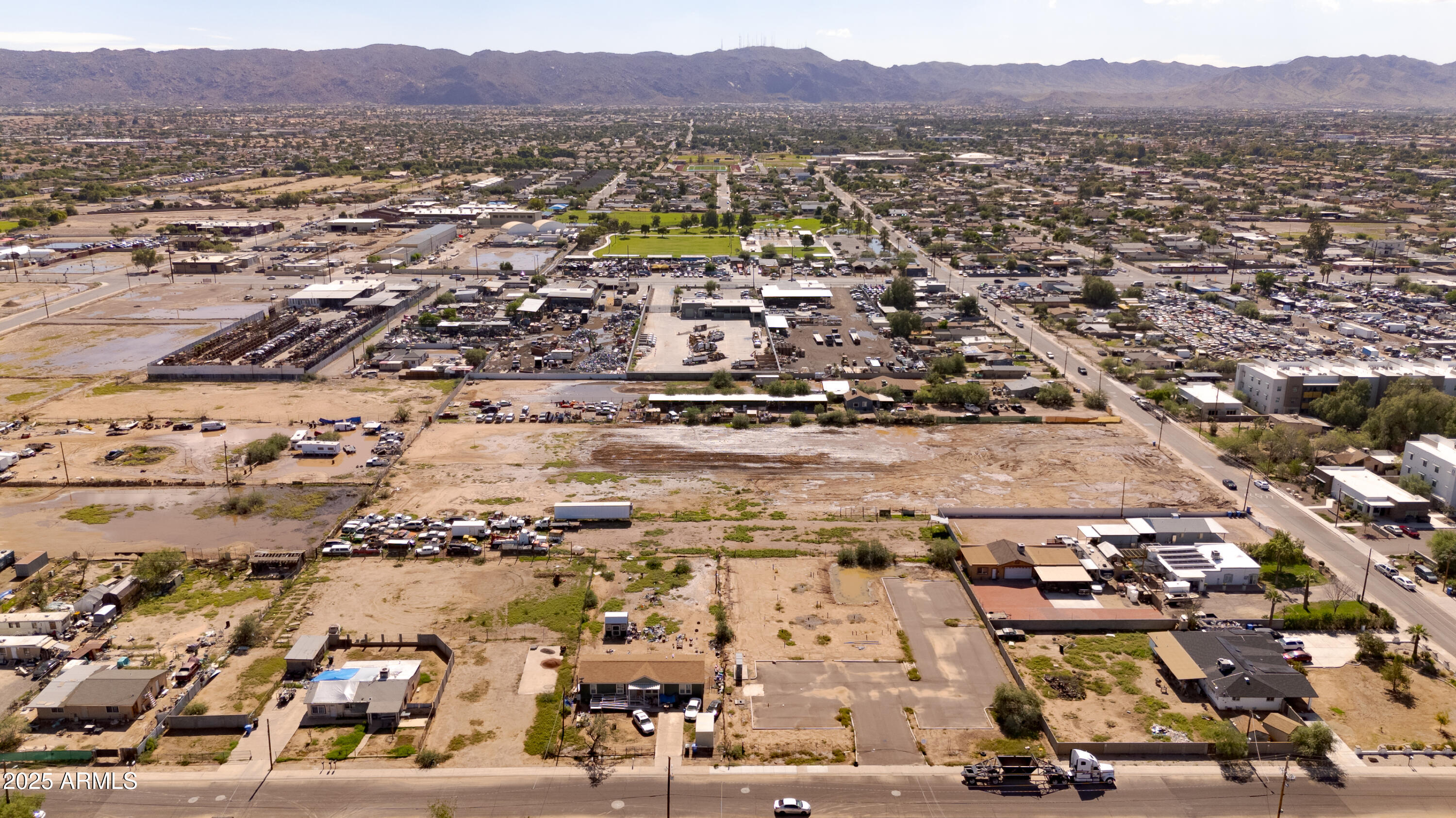 4035 South 9th Street, Unit 20/22 Phoenix, AZ 85040 - Photo 4 of 45 an aerial view of residential houses and outdoor space