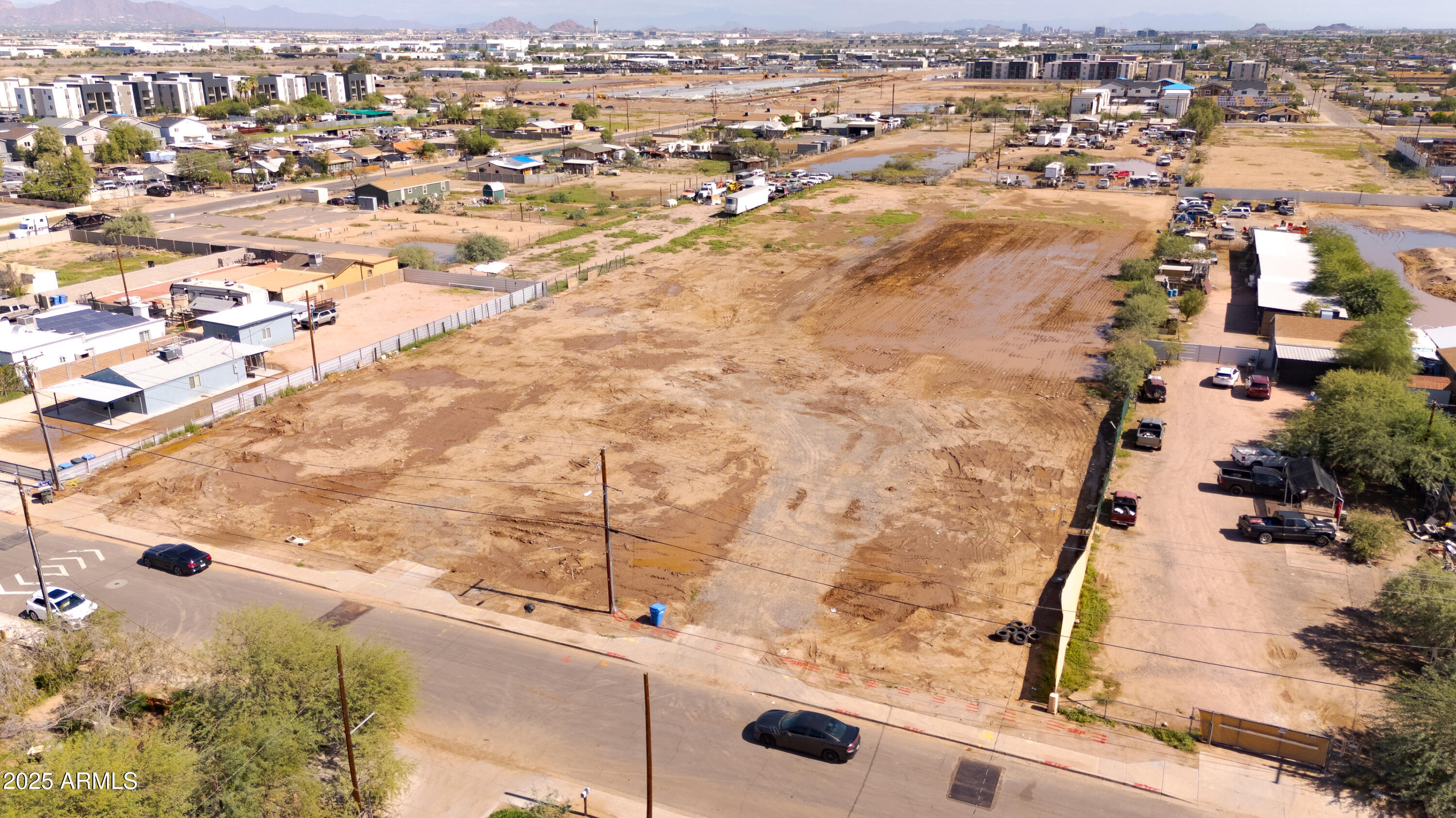 4035 South 9th Street, Unit 20/22 Phoenix, AZ 85040 - Photo 41 of 45 an aerial view of residential house with parking space