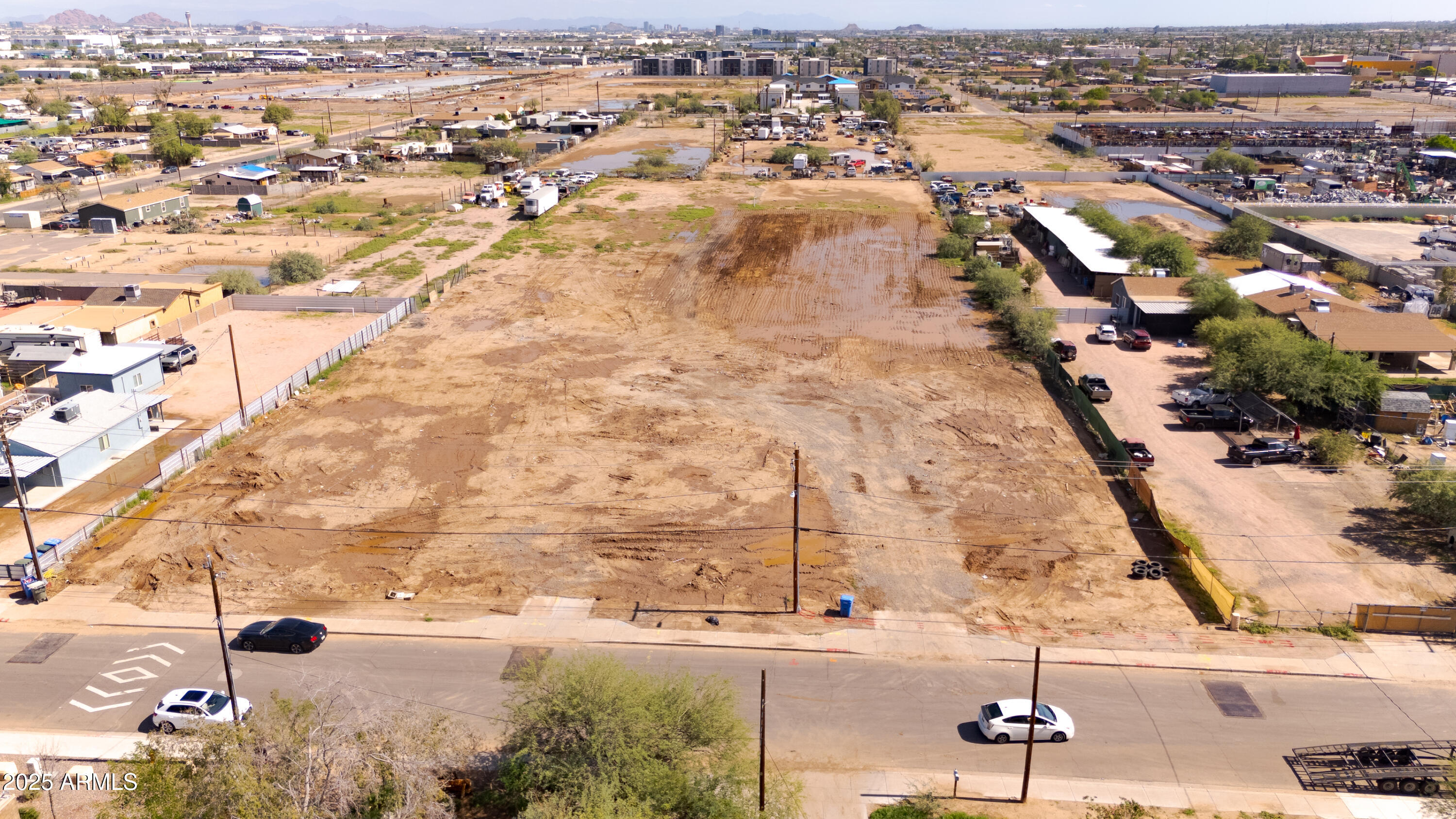 4035 South 9th Street, Unit 20/22 Phoenix, AZ 85040 - Photo 42 of 45 an aerial view of residential building with parking space