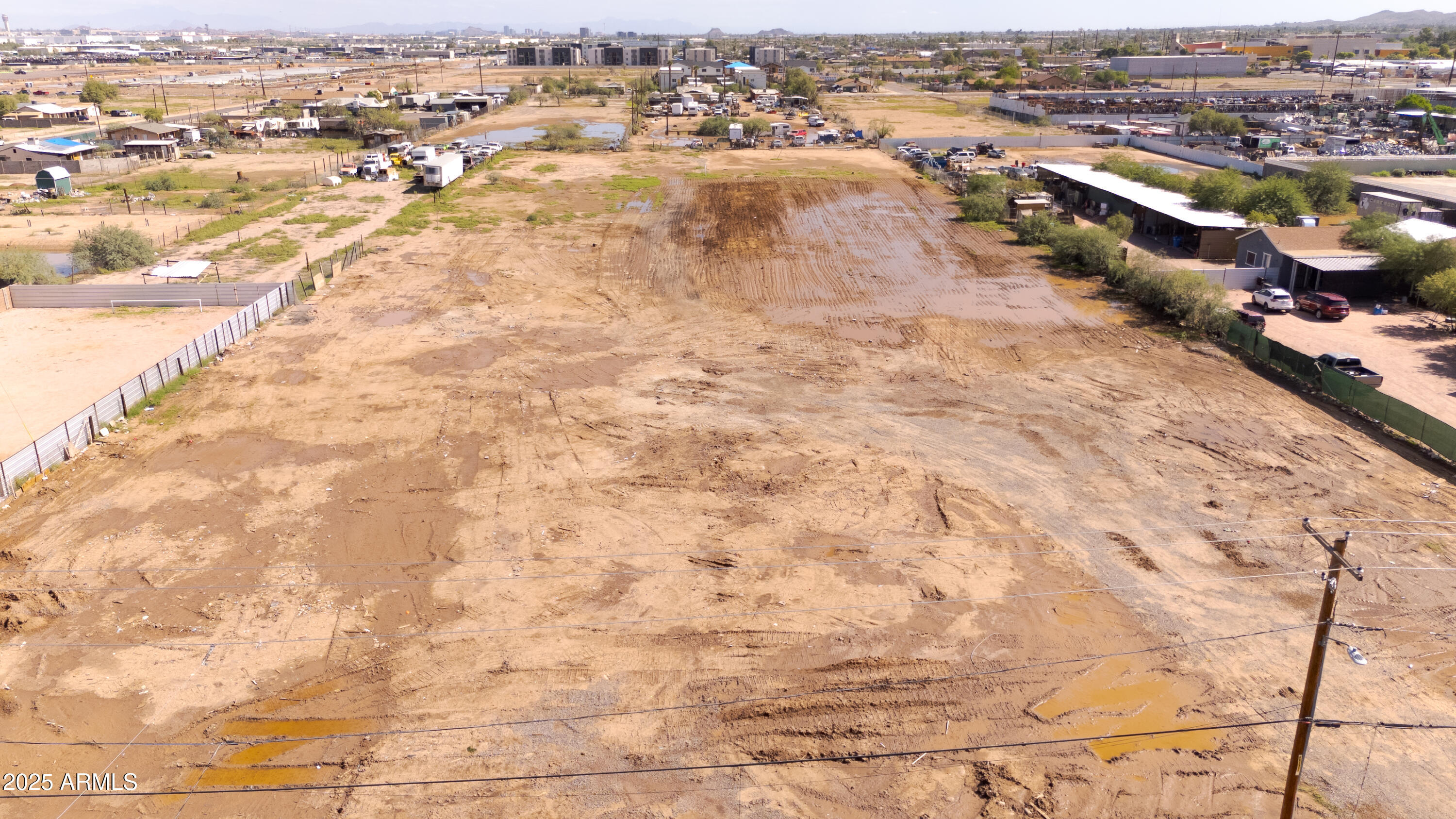 4035 South 9th Street, Unit 20/22 Phoenix, AZ 85040 - Photo 44 of 45 an aerial view of residential houses with outdoor space