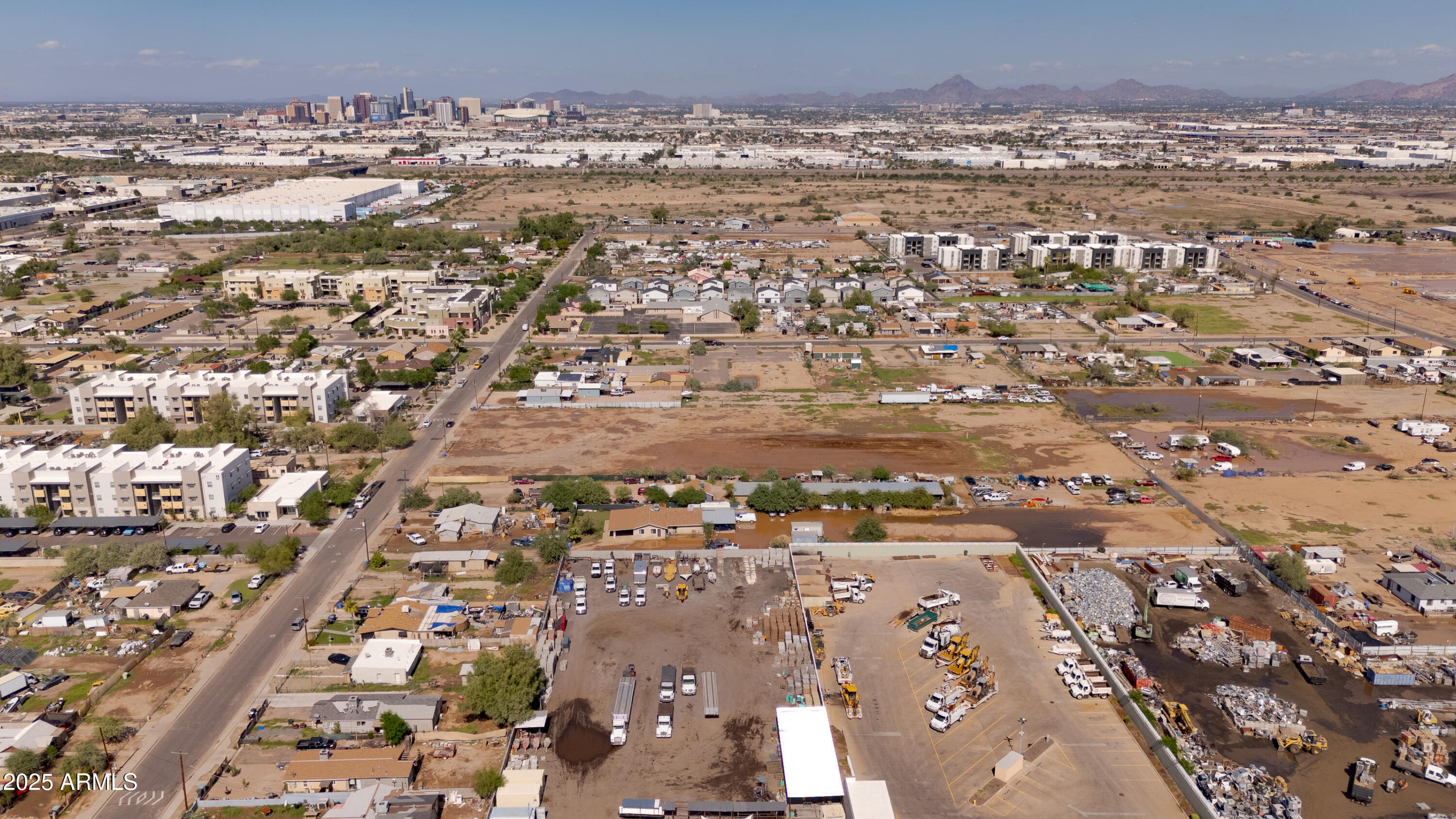 4035 South 9th Street, Unit 20/22 Phoenix, AZ 85040 - Photo 7 of 45 an aerial view of residential building with parking