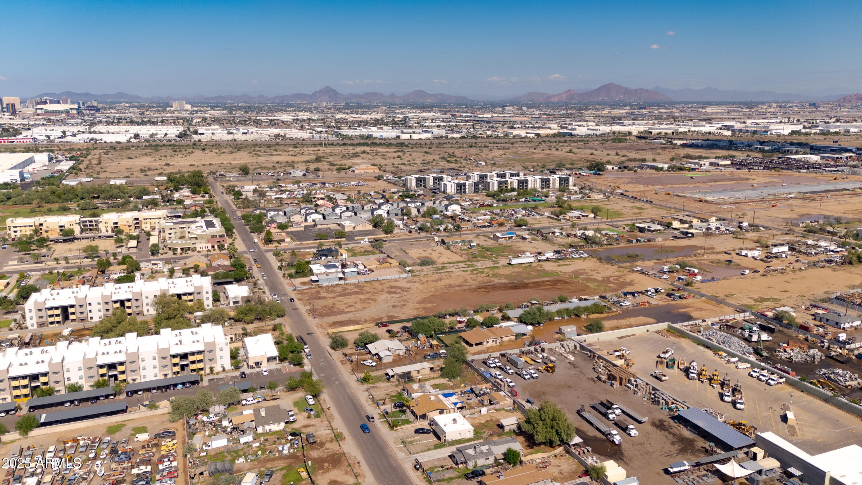 4035 South 9th Street, Unit 20/22 Phoenix, AZ 85040 - Photo 10 of 45 an aerial view of residential building with parking space