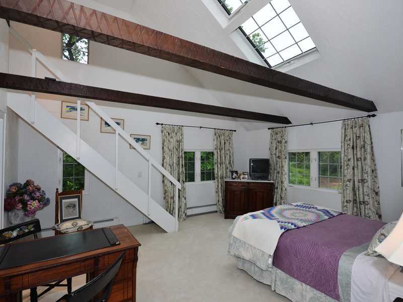 331 Hollow Tree Ridge Road Darien, CT 06820 - Photo 8 of 19 a bedroom with furniture and windows