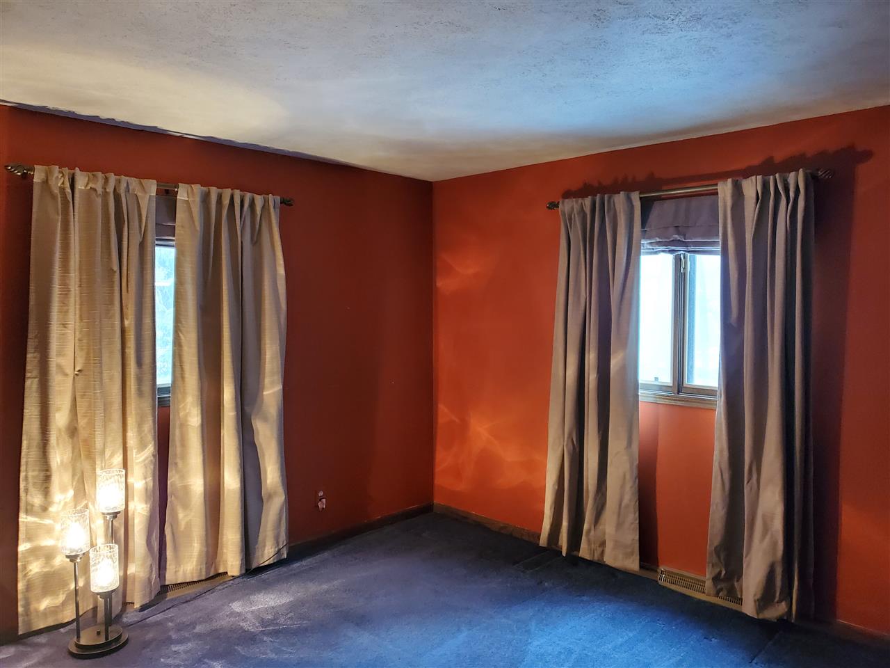 4802 Spring Creek Road Rockford, IL 61114 - Photo 19 of 25 an empty room with wooden floor and a window