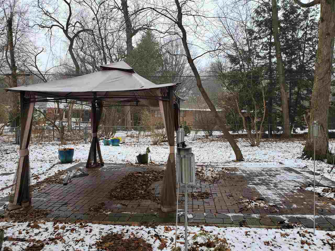 4802 Spring Creek Road Rockford, IL 61114 - Photo 24 of 25 a view of a house with a tree in the background