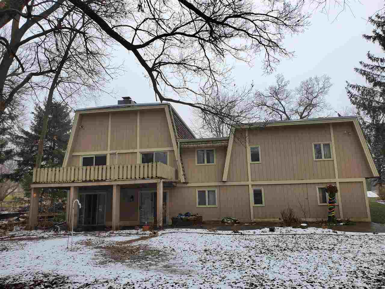 4802 Spring Creek Road Rockford, IL 61114 - Photo 25 of 25 a front view of a house with garden
