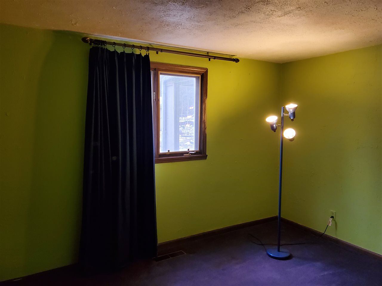 4802 Spring Creek Road Rockford, IL 61114 - Photo 7 of 25 a view of a room with wooden floor and windows