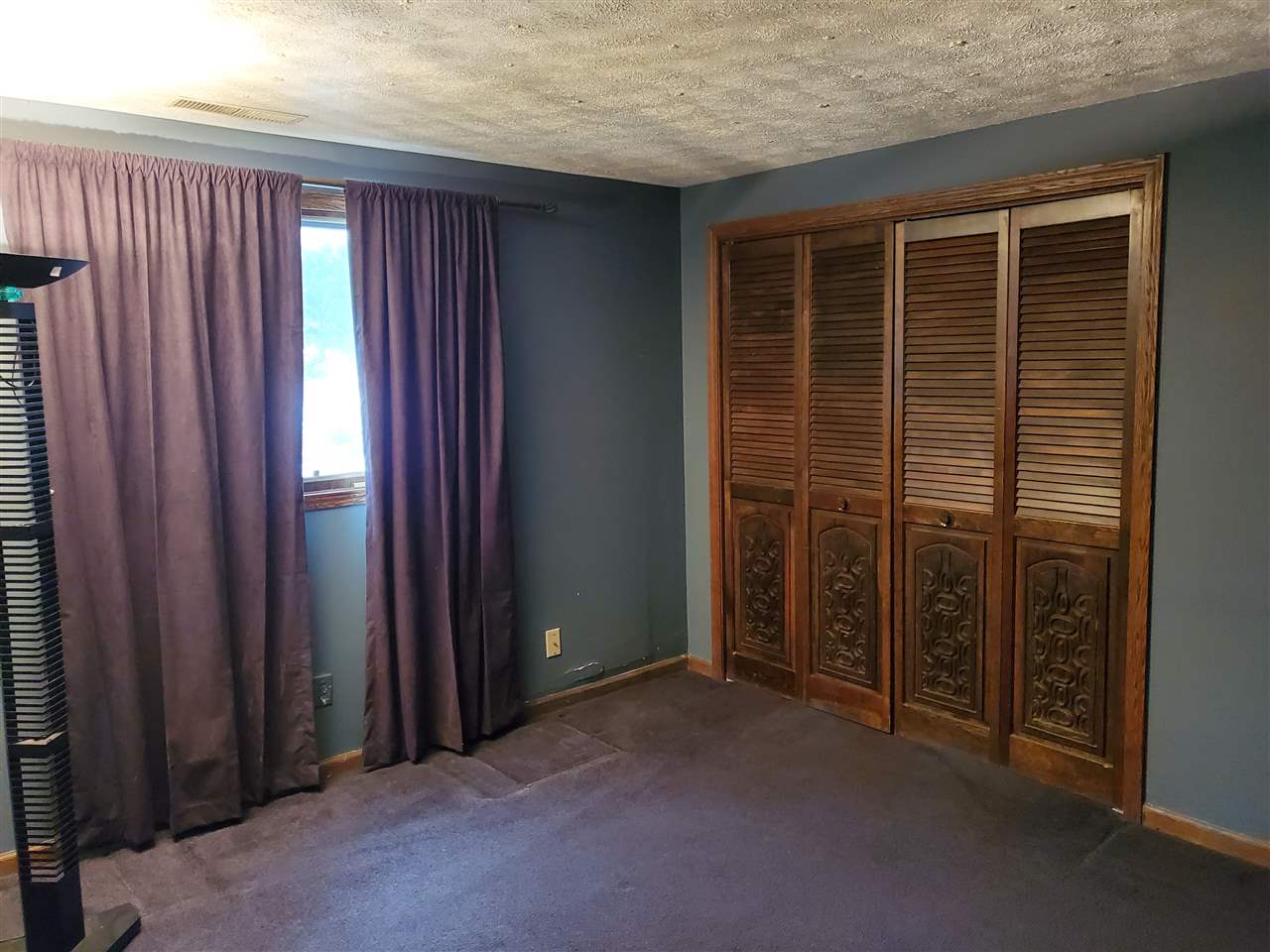 4802 Spring Creek Road Rockford, IL 61114 - Photo 8 of 25 an empty room with windows