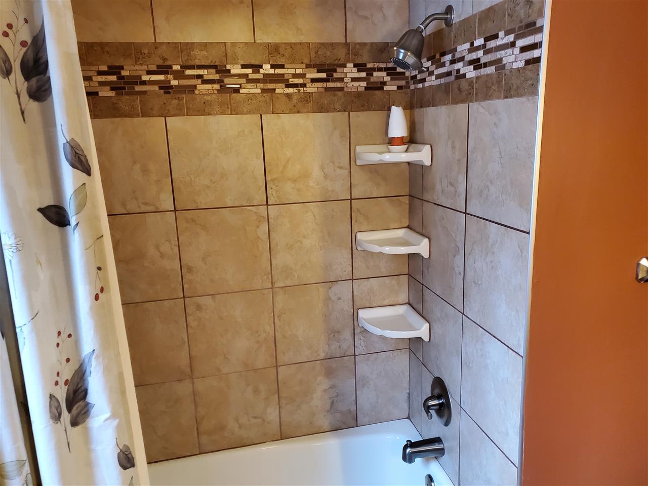 4802 Spring Creek Road Rockford, IL 61114 - Photo 10 of 25 a bathroom with a sink and mirror