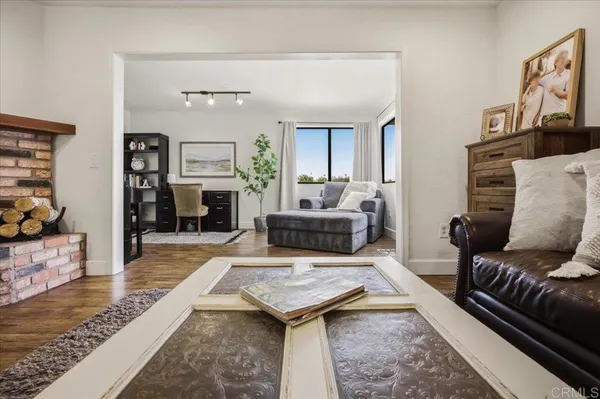 a kitchen with stainless steel appliances granite countertop a stove a sink and a granite counter tops