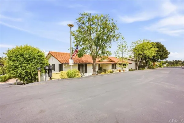 front view of a house with a street