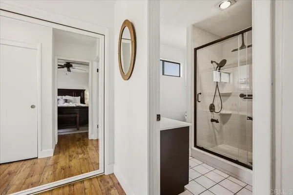 a view of a two chairs on the roof deck