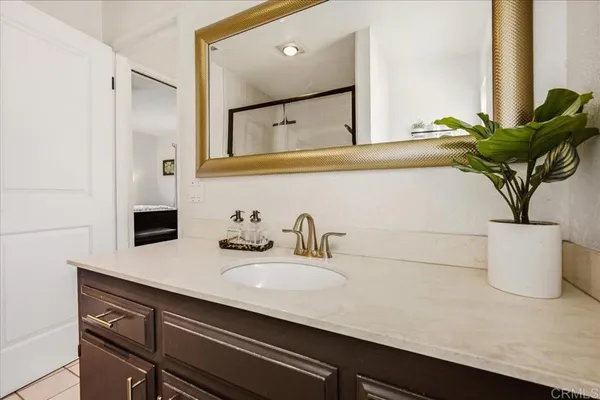 a view of an chairs and table in patio