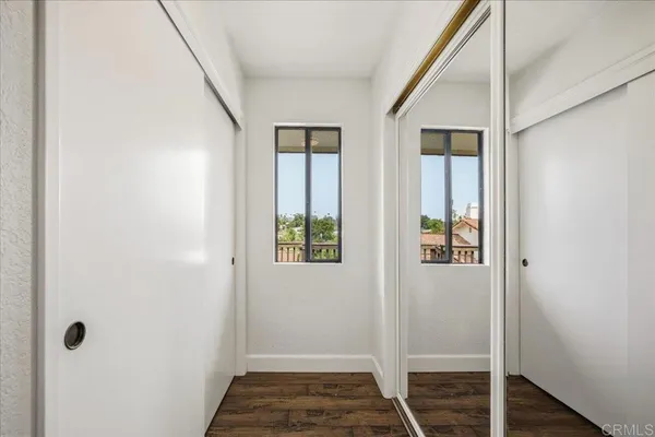 a view of a chairs and table in the patio