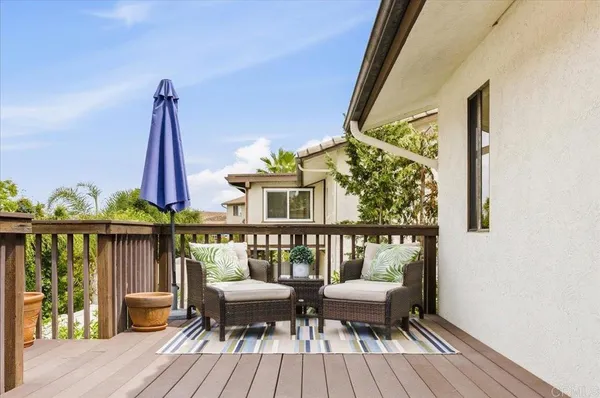 a view of a house with a yard porch and sitting area