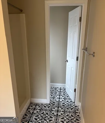 a bathroom with a sink and a shower