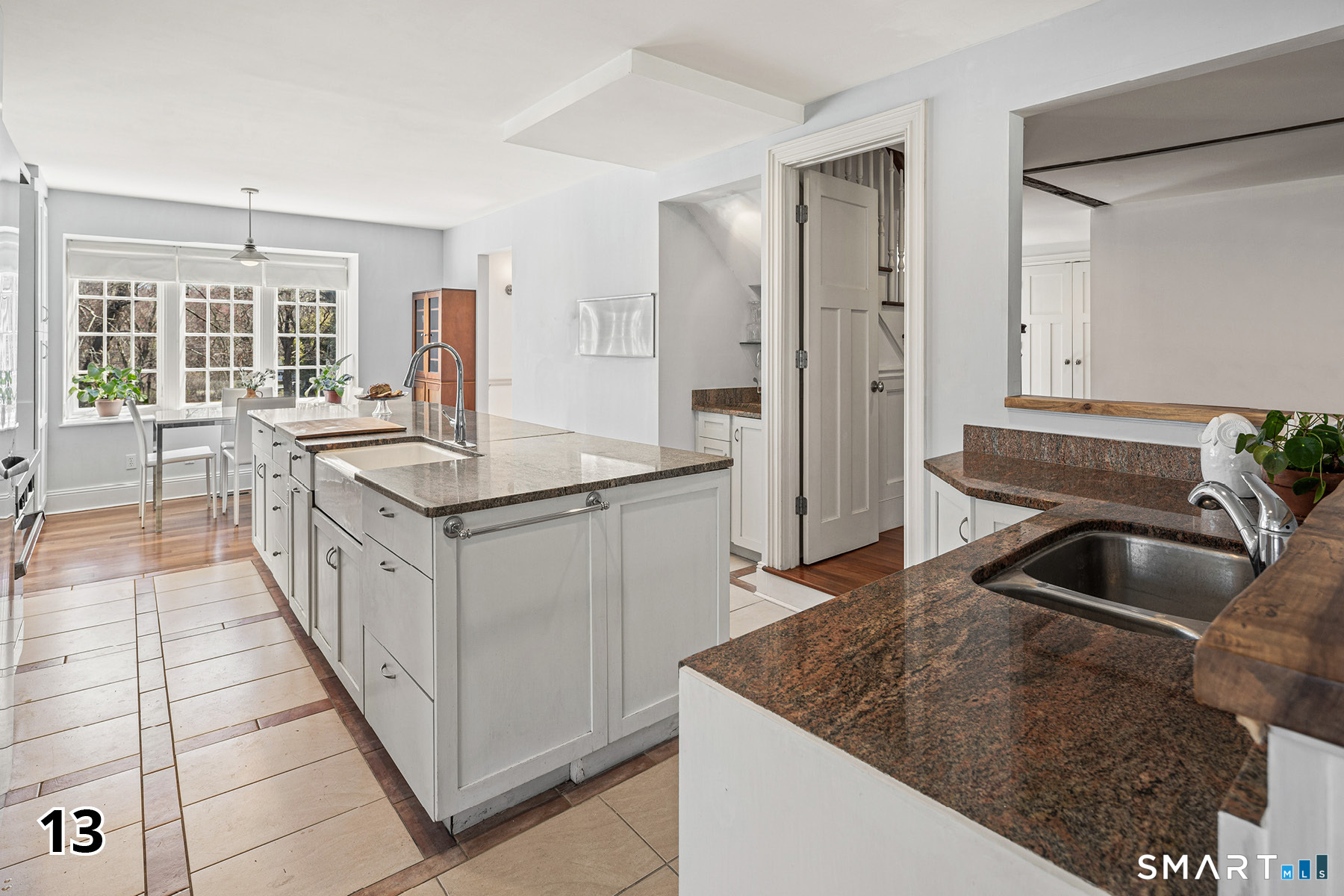 32 Steep Hill Road Weston, CT 06883 - Photo 10 of 41 a kitchen with granite countertop a sink and a stove top oven