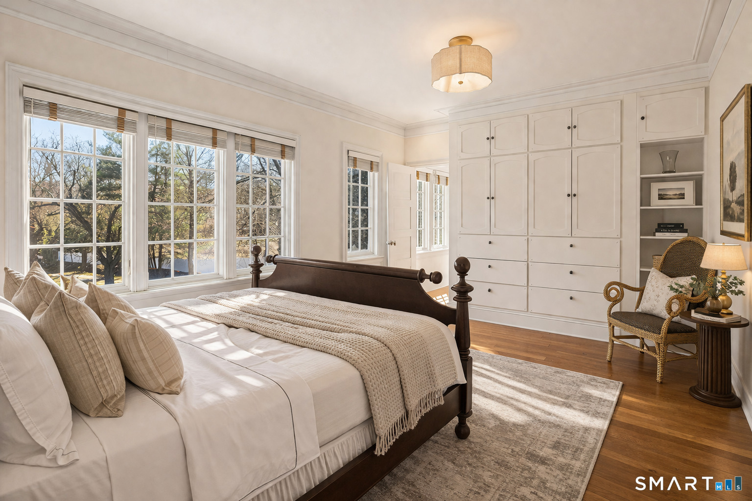 32 Steep Hill Road Weston, CT 06883 - Photo 15 of 41 a bed room with a bed and a chair