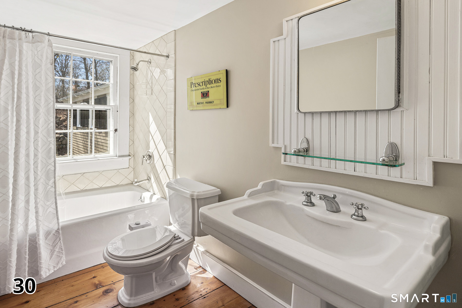 32 Steep Hill Road Weston, CT 06883 - Photo 24 of 41 a bathroom with a sink and a mirror