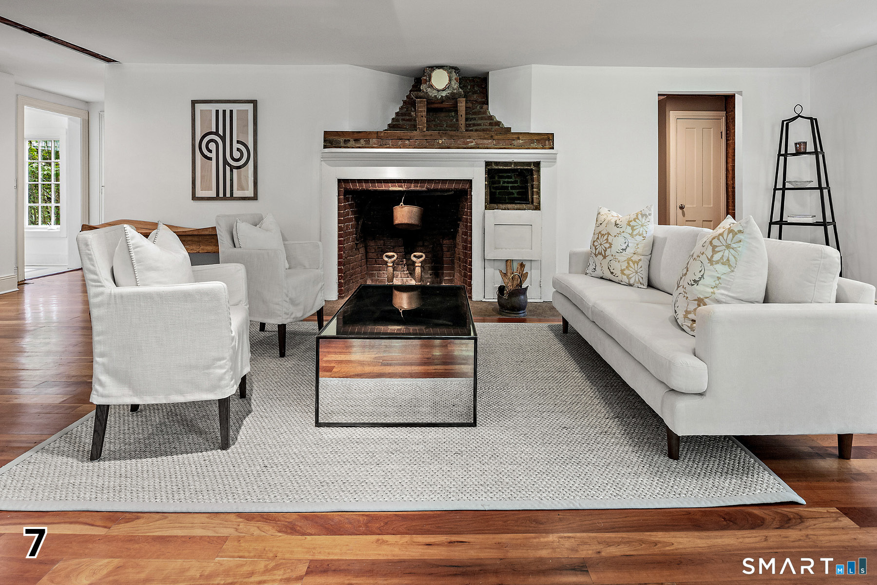 32 Steep Hill Road Weston, CT 06883 - Photo 6 of 41 a living room with furniture and a fireplace