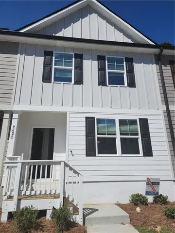 a front view of a house with windows