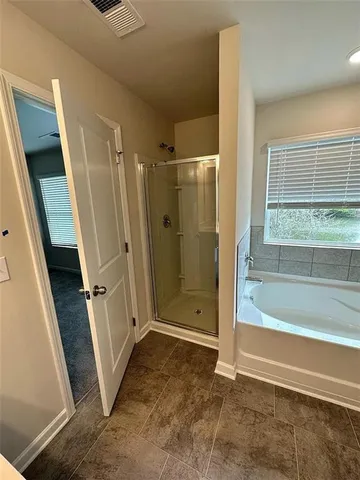 a bathroom with a sink a vanity and a mirror