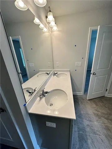 a view of storage and utility room with empty racks