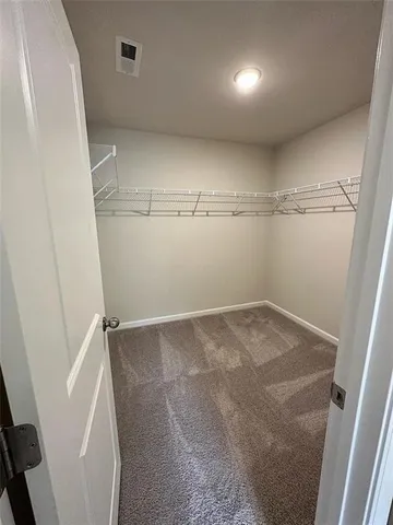 a bathroom with a toilet and a sink